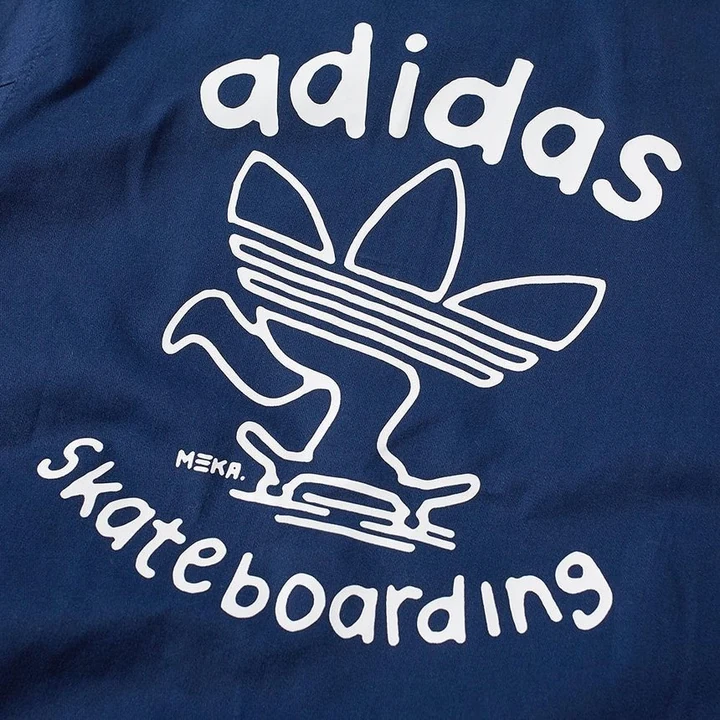 Navy piece — trefoil skater and hand-drawn adidas skateboarding lettering, signed MEKA.