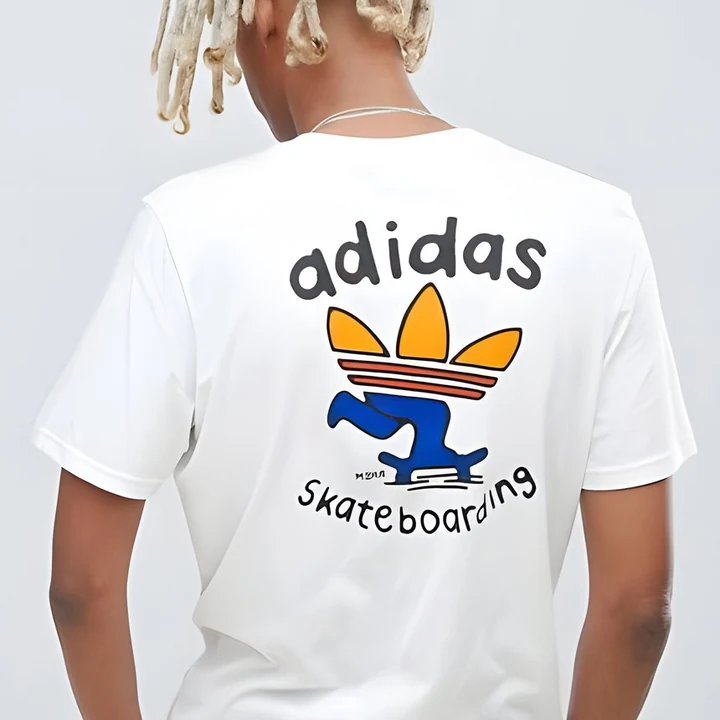 Worn — white adidas skateboarding tee, shot from behind