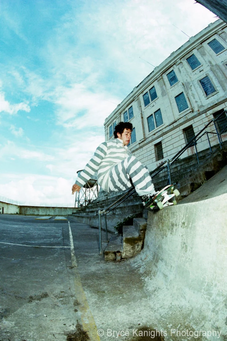 Mark Gonzales skating Alcatraz in a prisoner uniform — photo by Bryce Kanights, the brief's reference