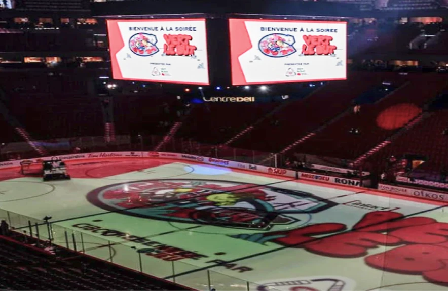 The Bell Centre ice before the doors open, artwork on the scoreboard