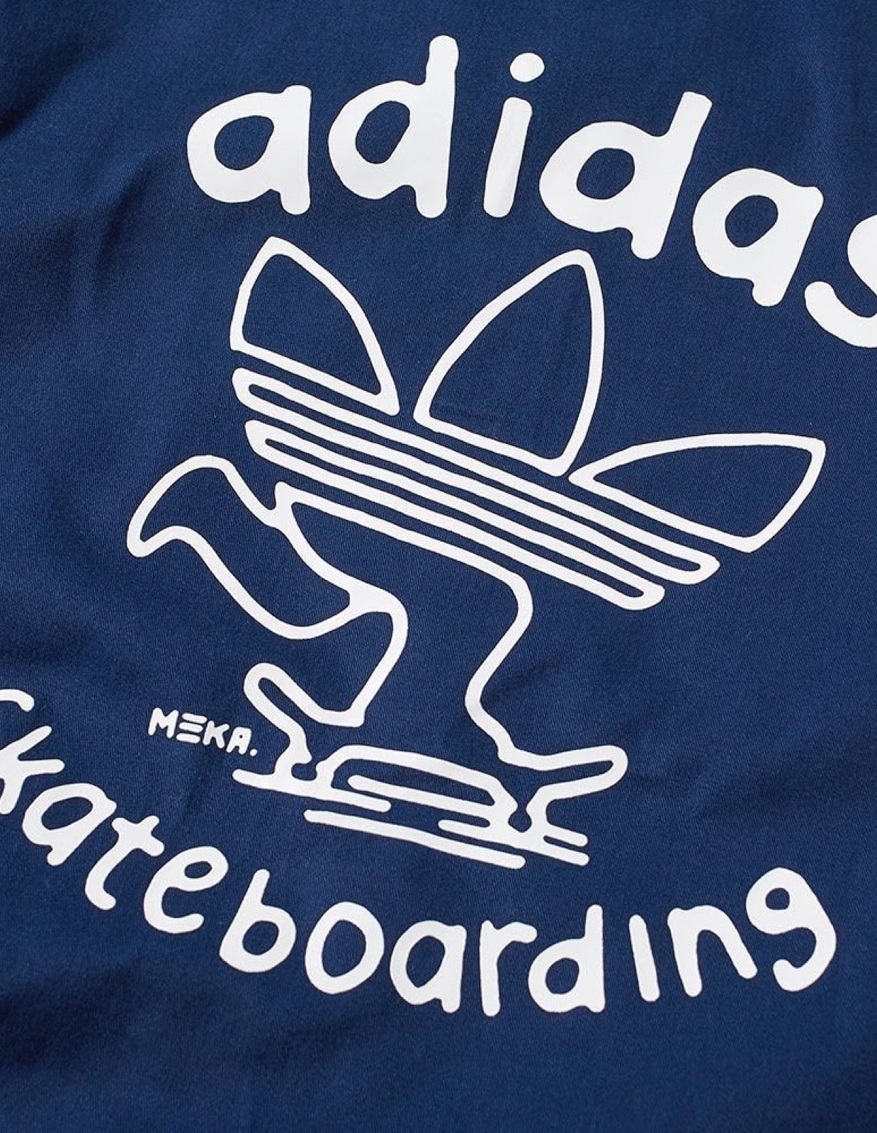 adidas Skateboarding tee — the character drawn into the trefoil lockup
