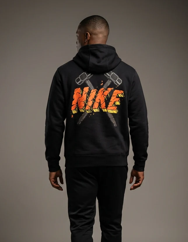 Hoodie worn from the back, NIKE in orange block letters