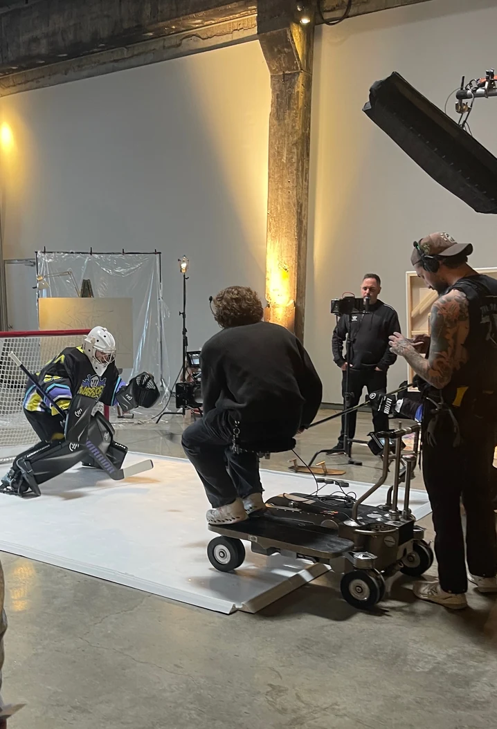 The goalie down in the butterfly while the camera dolly rolls in